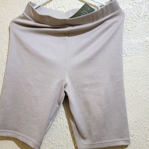 Beige ribbed biker shorts.